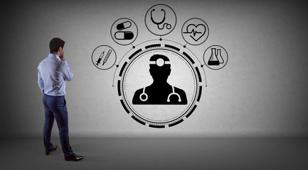 Businessman watching medical interface on a wall 3D rendering