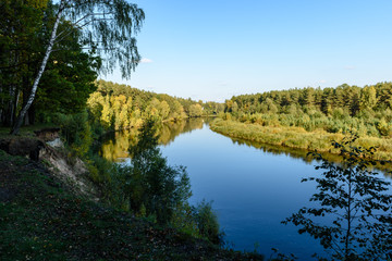 high water level in river Gauja, near Valmiera city in Latvia. summer trees surrounding