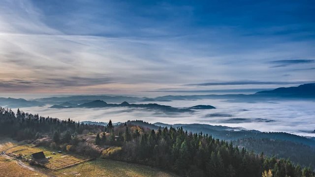 Misty sunrise landscape from Luban peak in Gorce mountains, Poland. Timelapse 4k