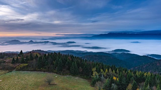 Misty sunrise landscape from Luban peak in Gorce mountains, Poland. Timelapse 4K