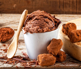 Chocolate ice cream on a vintage wooden table
