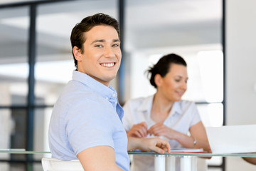 Young man in casual in office