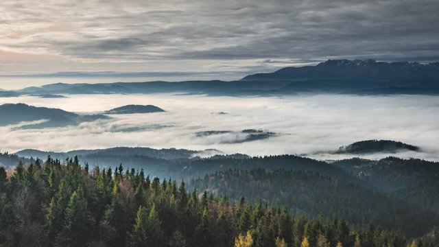 Misty sunrise landscape from Luban peak in Gorce mountains, Poland. Timelapse 4K