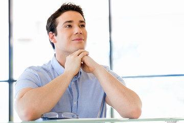 Young man in casual in office