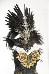 dark gothic dress formed by a silver metal tiara and a golden corset, handmade costume