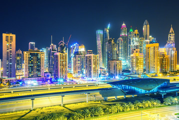Fototapeta na wymiar View on Dubai Marina skyscrapers and metro station,Dubai,United Arab Emirates