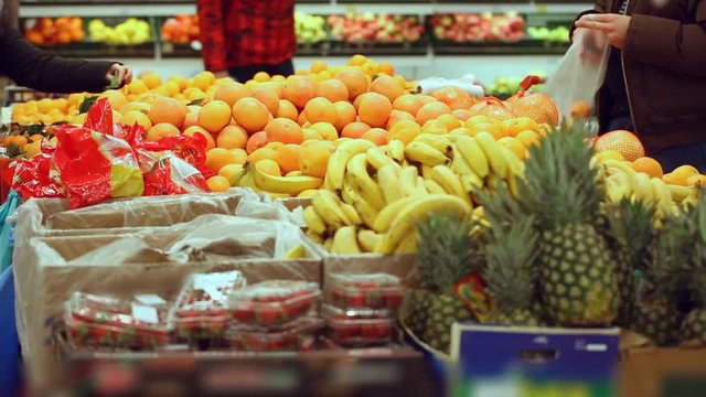 Customers at vegetable shop