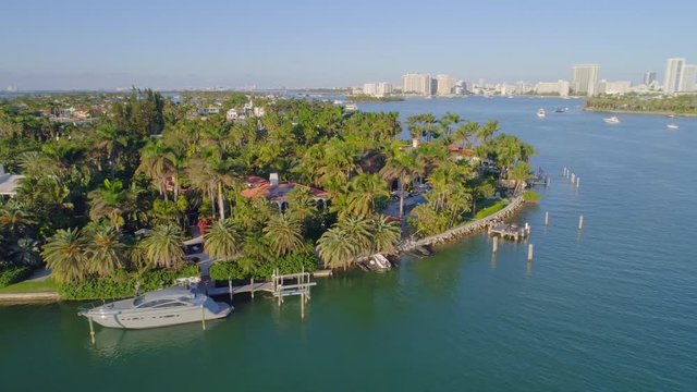 Drone flying over Miami Beach mansions 4k 24p