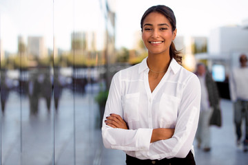 Happy bright positive enthusiastic business person female smiling confidence and successful personality