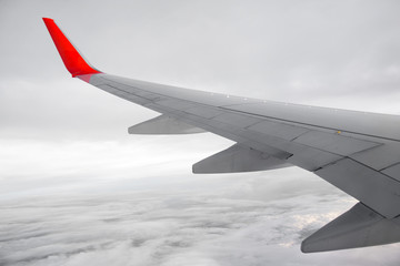 Morning sunrise with Wing of an airplane. Photo applied to tourism operators. picture for add text message or frame website. Traveling concept.