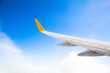 Morning sunrise with Wing of an airplane. Photo applied to tourism operators. picture for add text message or frame website. Traveling concept