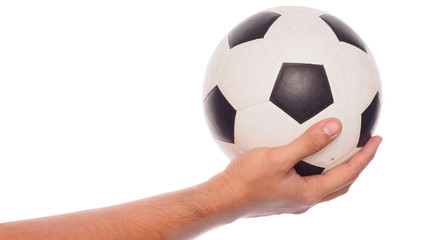 male hand holding football