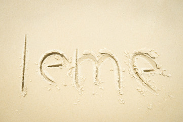 Leme, the neighbourhood next to Copacabana, the famous beach, message handwritten on smooth sand in Rio de Janeiro, Brazil