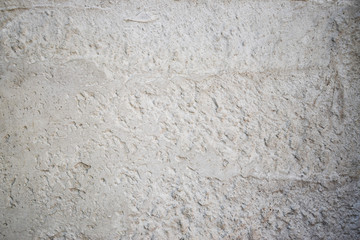 oncrete wall with interesting patterns, craters