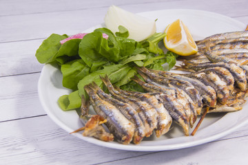 fried fish and salad