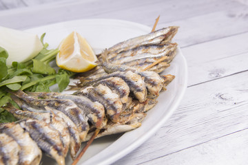 fried fish and salad