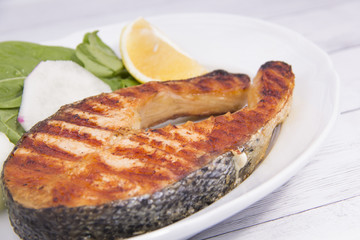 Fried salmon and salad