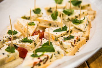 Food on a plate, on a wooden background.Food detail