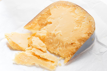parmesan cheese on a piece of paper wrapping.