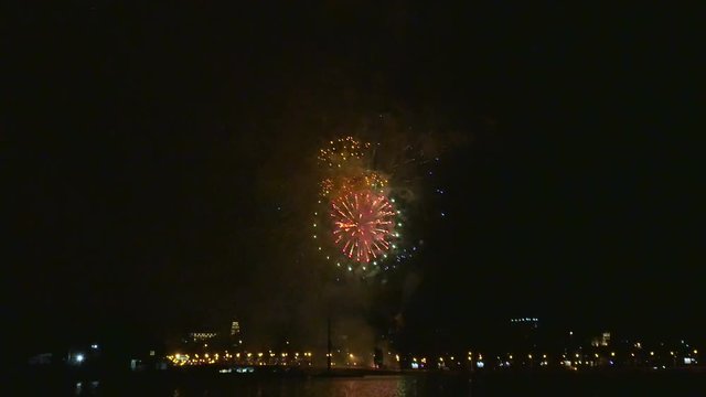 4k shot of colorful fireworks at holiday dring night