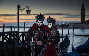 Venice, Italy - February 25, 2017: Famouse Venice Carnival. Masked people.