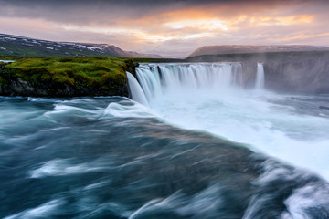 Fototapeta premium Colorful sunrise on Godafoss waterfall on Skjalfandafljot river, Iceland, Europe