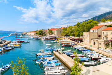 View of Bol port with colorful fishing boats, Brac island, Croatia
