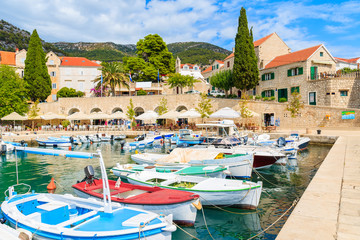 Fototapeta na wymiar View of Bol port with colorful fishing boats, Brac island, Croatia