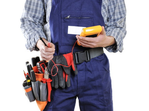 Young electrician technician in clothes and work tools isolated on white background.