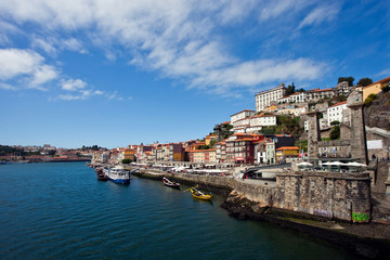 Fototapeta na wymiar Panorama of the city of Porto in Portugal on the river bank on a clear summer day