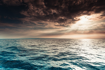 Obraz premium Baltic sea sunset horizon and cloudy sky