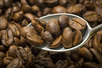 Roasted Coffee Beans macro close up image for background.