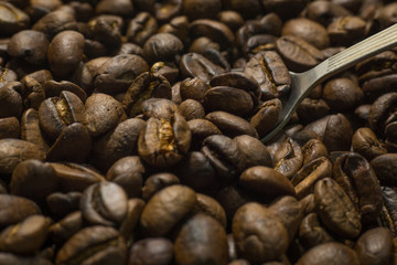 Roasted Coffee Beans macro close up image for background.