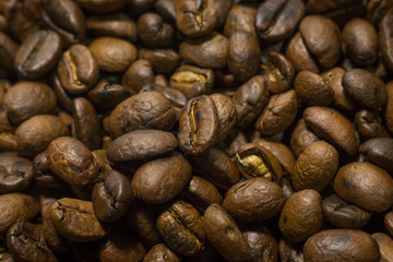 Roasted Coffee Beans macro close up image for background.