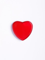 Single red heart isolated on white background. Copy space. Valentines day card. Flat lay.