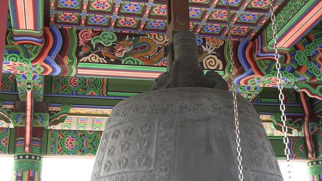 Tilt shot showing the intricate detail of the Korean Bell of Friendship in Los Angeles