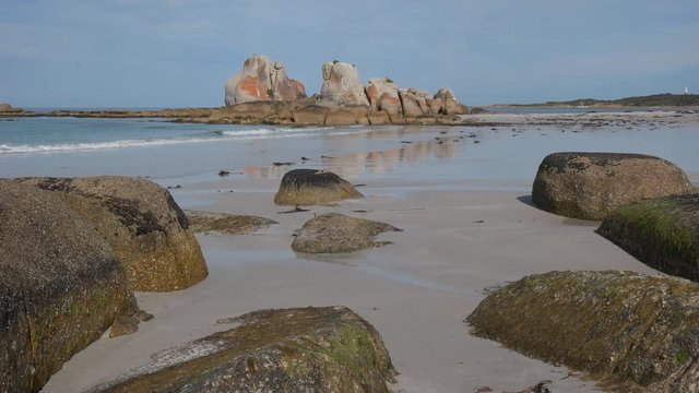 the white sand beach at picnic rocks in the bay of fires region of tasmania, australia