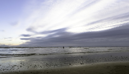 Sunset on Crosby Beach in winter, Crosby, Liverpool, United Kingdom