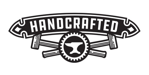 Handcrafted design or badge with hammers
Vector design featuring, crossed hammers, cog and anvil with handcrafted banner.