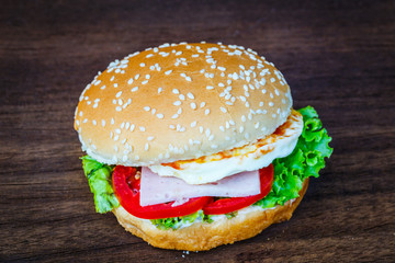 Hamburger on wooden floor