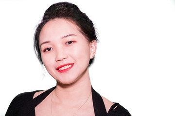 A portrait of a young oriental girl with up-do hair