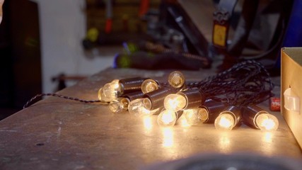 Lights for decorating house at christmas eve holidays, lying on the table.