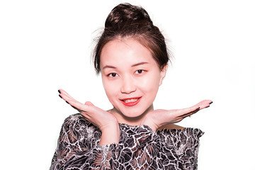 A portrait of a young oriental girl with up-do hair