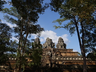 Naklejka premium Siem Reap, Cambodia-December 23, 2017: Ta Keo is a temple mountain in Siem Reap. The four stairways that lead on the summit are continuous and very steep.