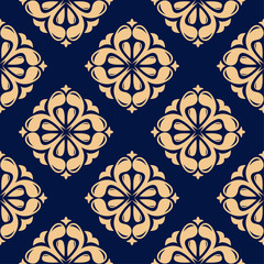 Golden floral seamless pattern on blue background