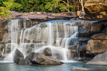 Fototapeta na wymiar Waterfall on river in the deep jungle