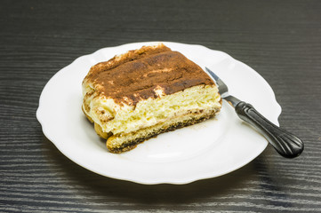 A delicacy of Italian cuisine - Tiramisu dessert.