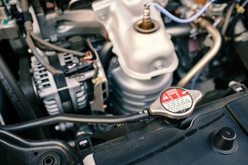 details of car engine, car radiator cap, old film look effect, internal combustion engine vehicle