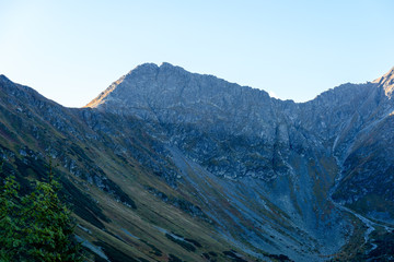 slovakian carpathian mountains in autumn. sunny hill tops in summer at sunrise