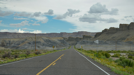 Utah State Route 24 highway passing through canyons and badlands near Capitol Reef National Park
Caineville, Wayne County, Utah, USA